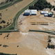 This aerial view shows a flooded area beside the Oppegawa River in Kawagoe, Japan, on October 13, 2019, one day after Typhoon Hagibis left at least 15 people dead.